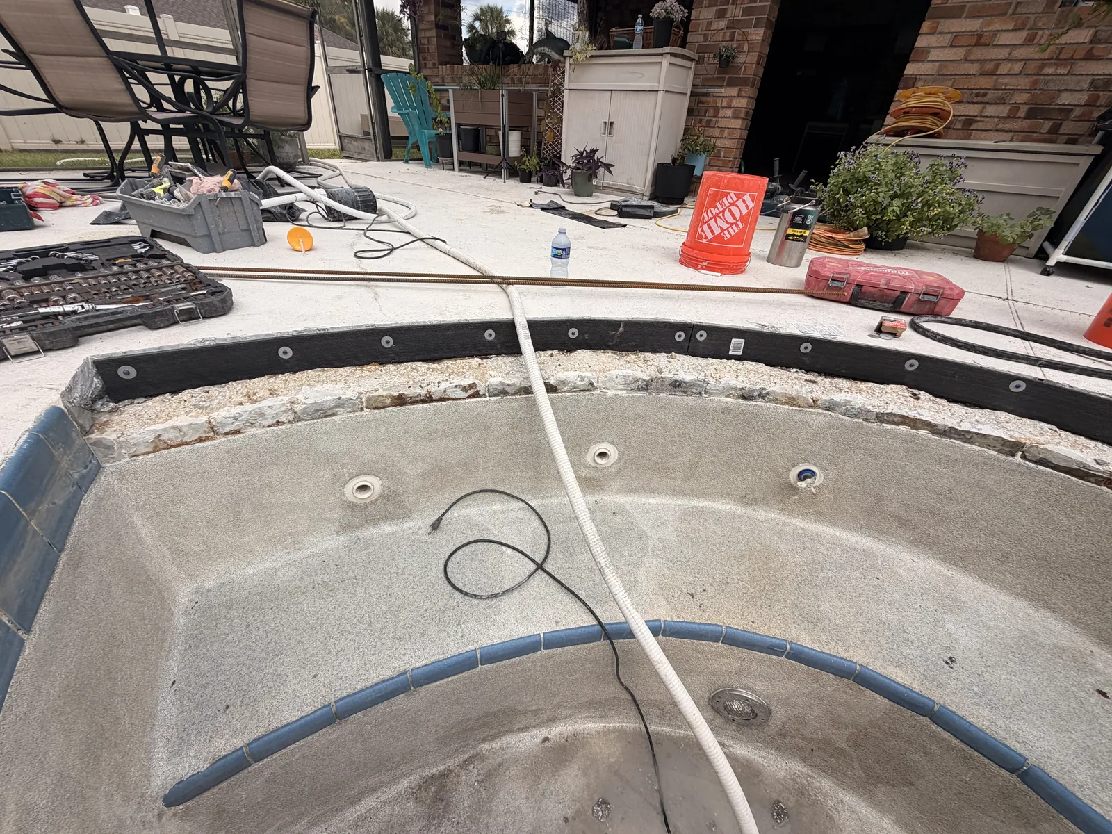 Spa bond beam opened end to end with an expansion joint set against the deck slab — Deltona, FL