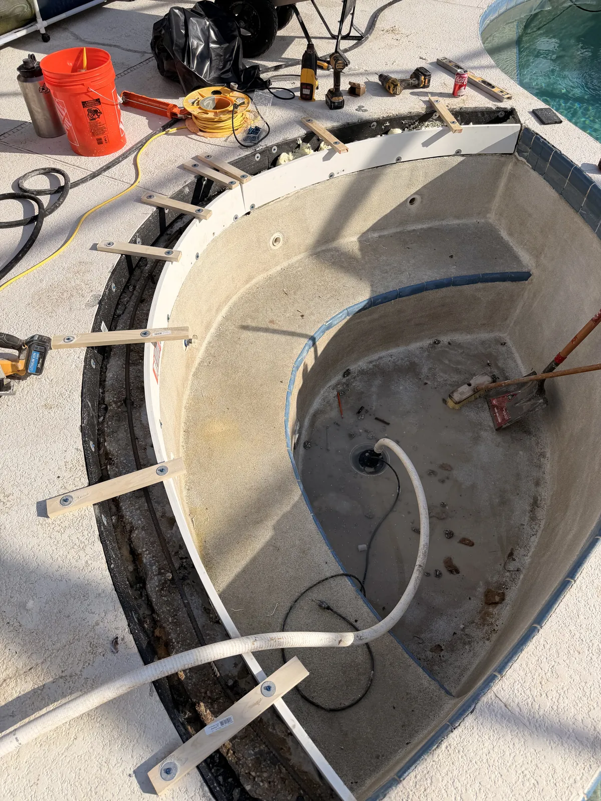 Wood forms set and braced along the spa bond beam — Deltona, FL