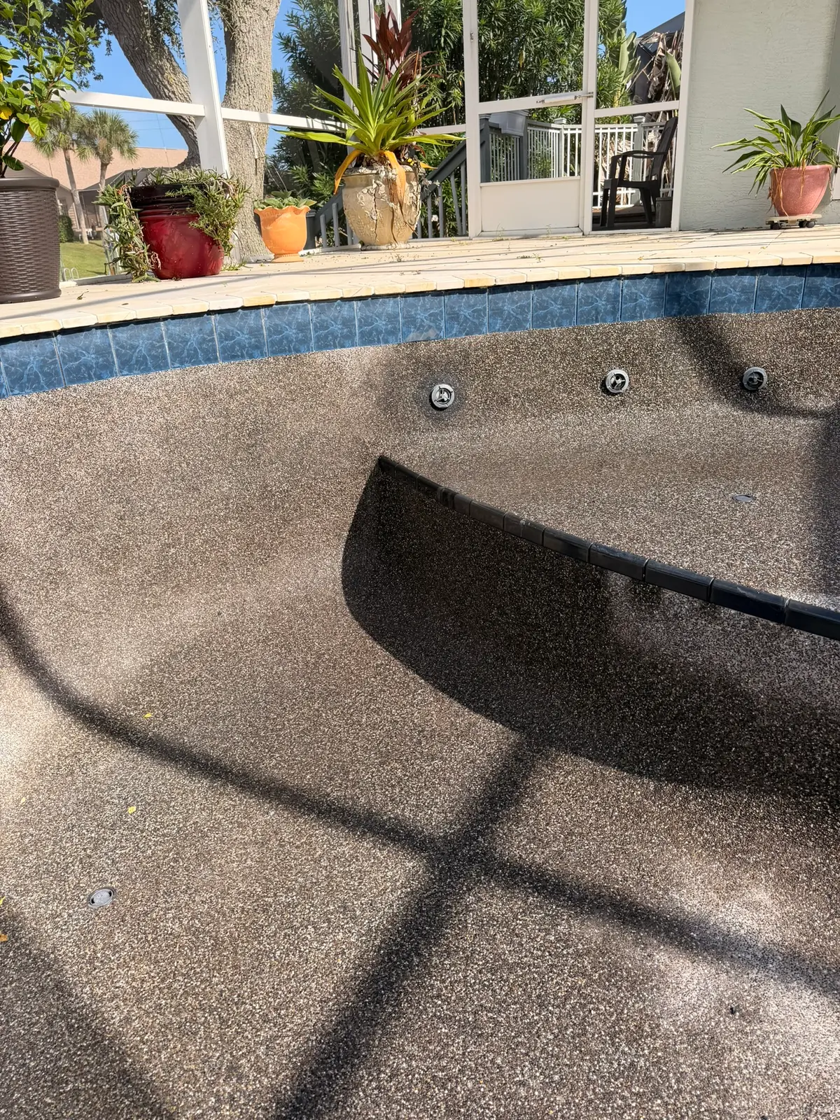 Pool wall with the finish rebuilt around the jets before refilling &mdash; Palm Coast, FL